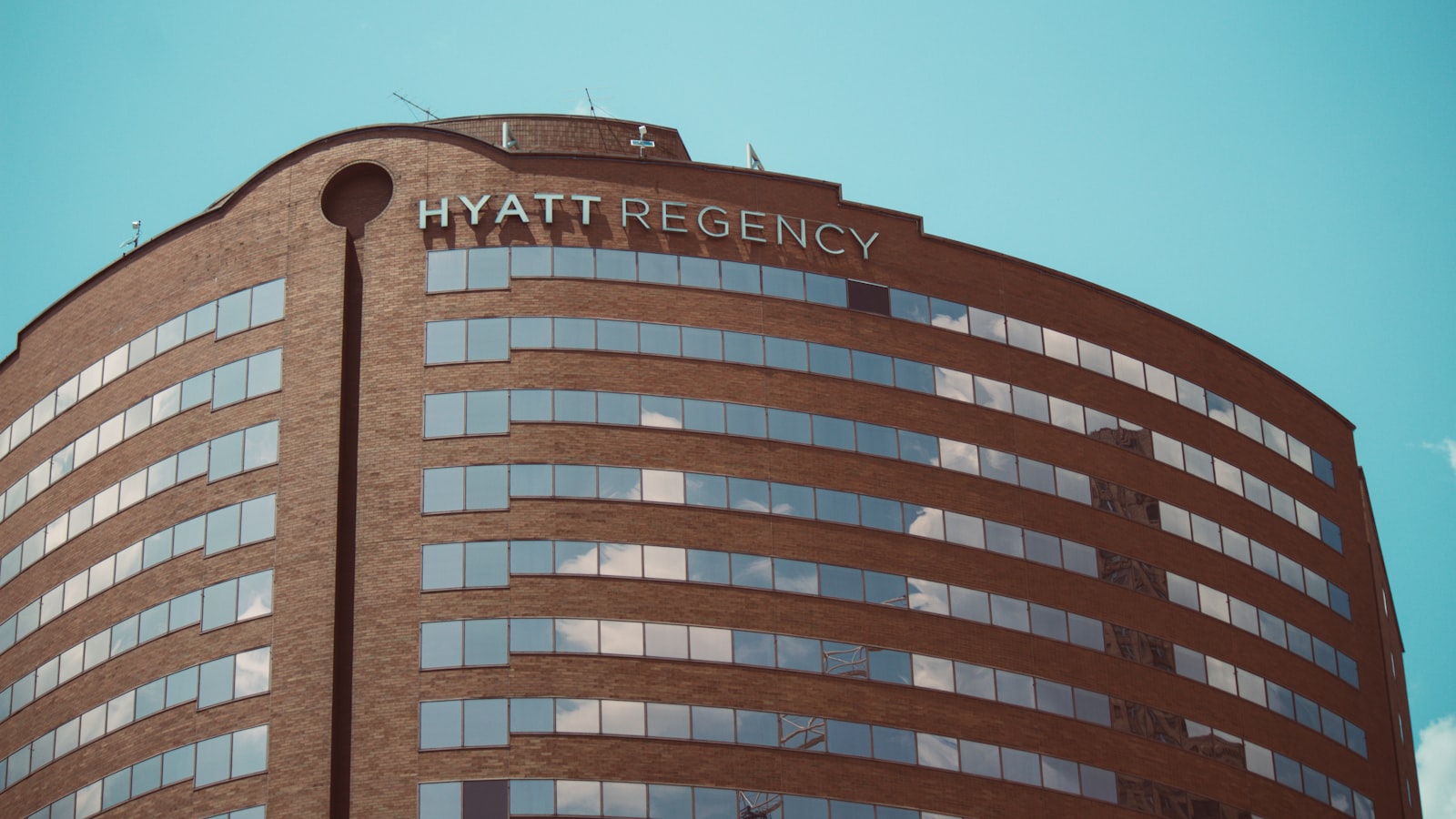 a tall building with a sky background