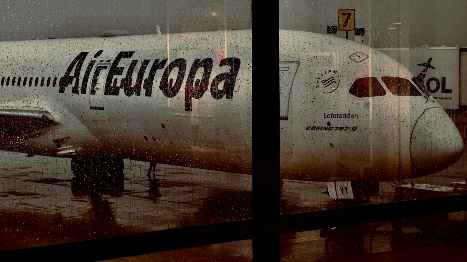 Air Europa plane seen through the airport windwos