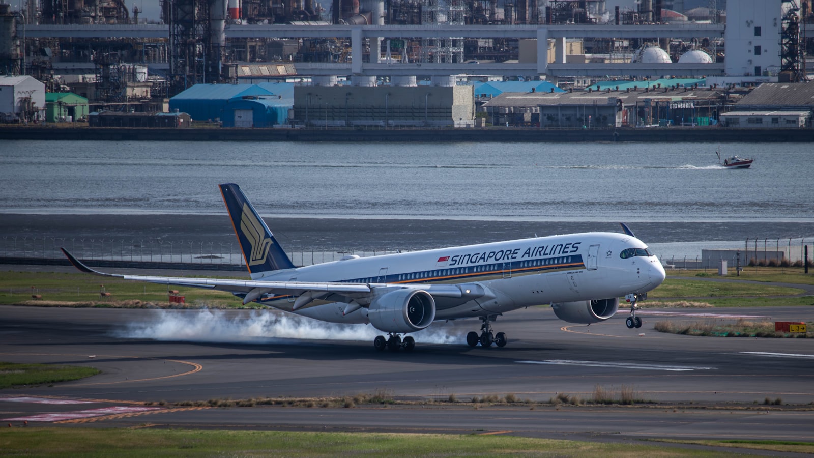 A large Singapore airlines airplane taking off