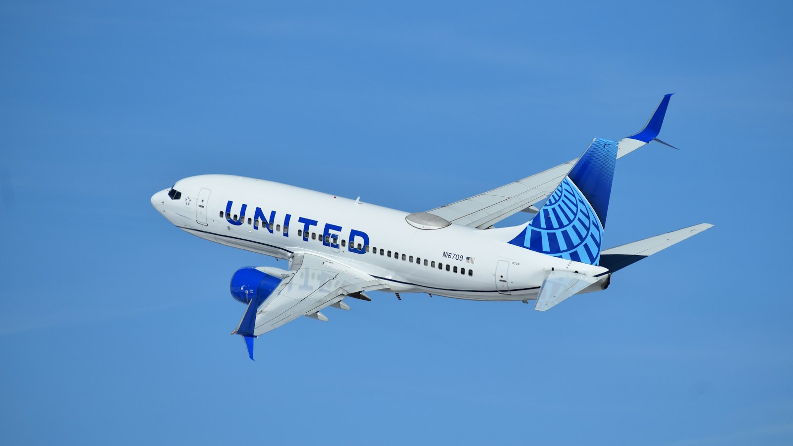 a United airlines plane flying in the sky